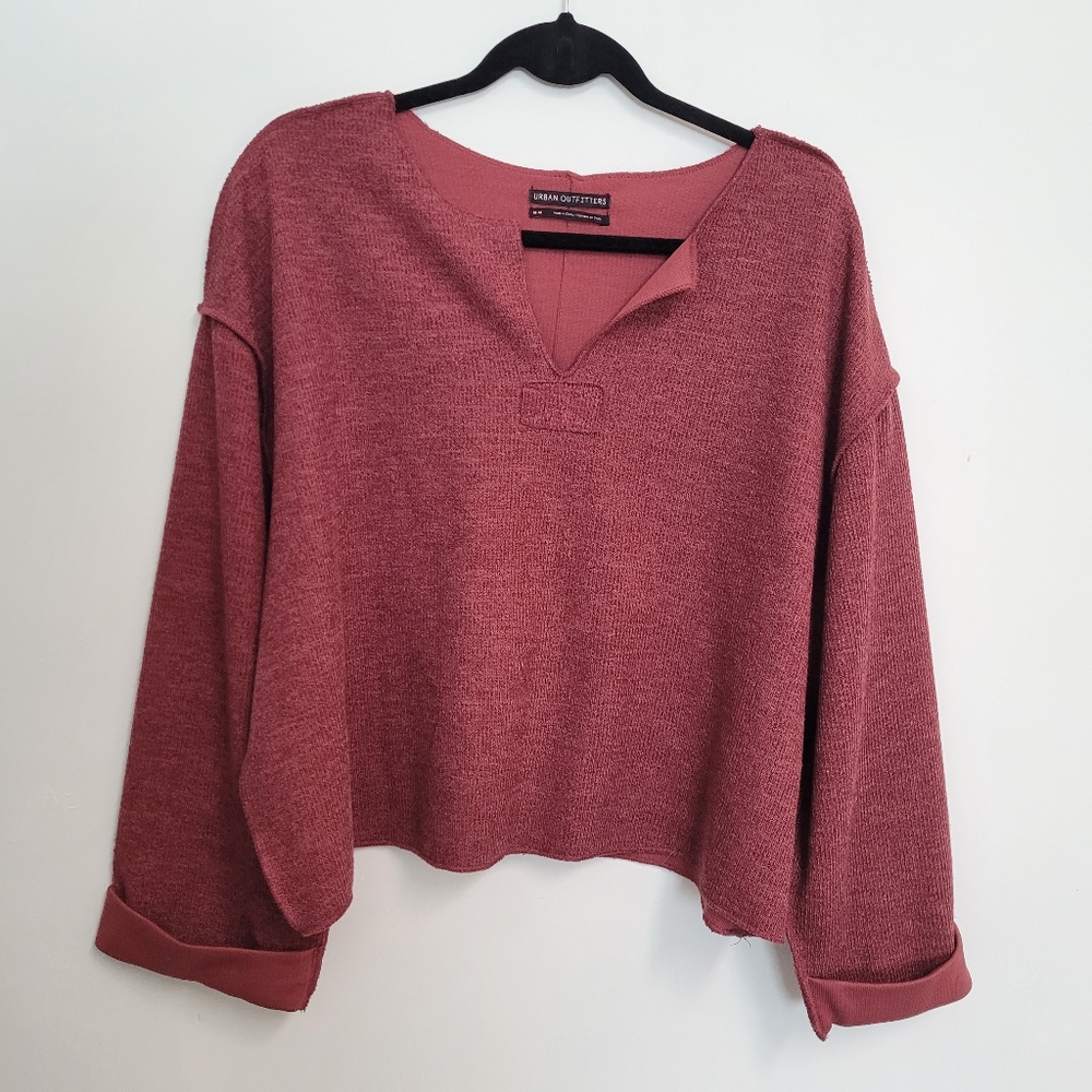 Nwot Urban Outfitters red jax inside out notch neck sweater in size Medium.
